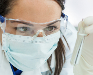 Image of scientist with test tube